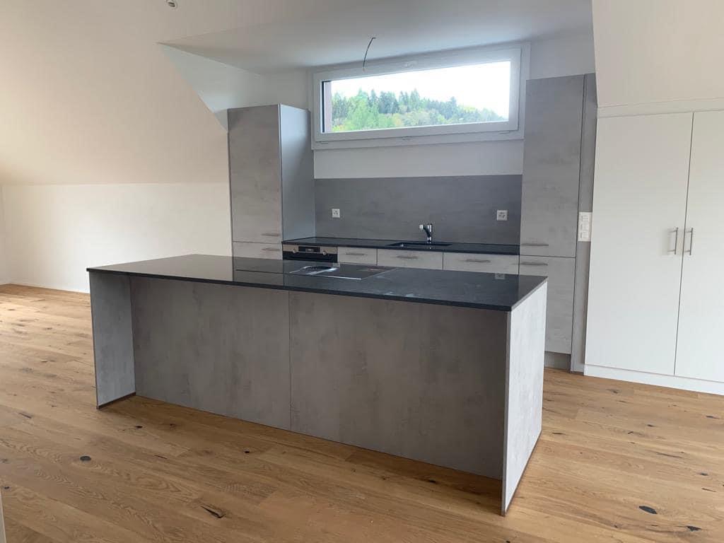 Bauunternehmen Zürich — Totalsanierung MFH, Ennetbaden: neue Küche und Wohnraum